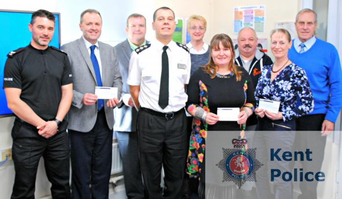 From left to right: Police Sergeant Ben Norbury from the Community Policing Team, Noel Beamish, Jon Green, Chief Inspector Fox, Caroline Taylor, Elleanor Scott, Phil Scott, Linda Ford and John Ford